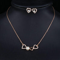 Side angle view of Khaista pearl heart set
