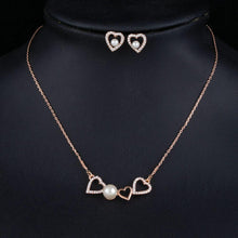 Load image into Gallery viewer, Hearts with a Pearl Stud Earrings + Pendant Necklace Set - KHAISTA Fashion Jewellery
