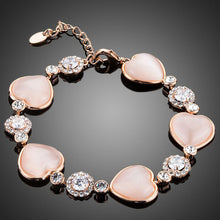 Load image into Gallery viewer, Hearts with Studs Crystal Bracelet - KHAISTA Fashion Jewellery
