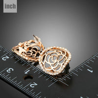 hollow flower crystal stud earrings detail view by KHAISTA