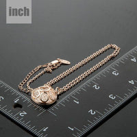 Pendant detail on KHAISTA hollow round crystal pendant necklace