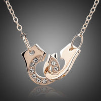 KHAISTA hook link chain crystal necklace on white background