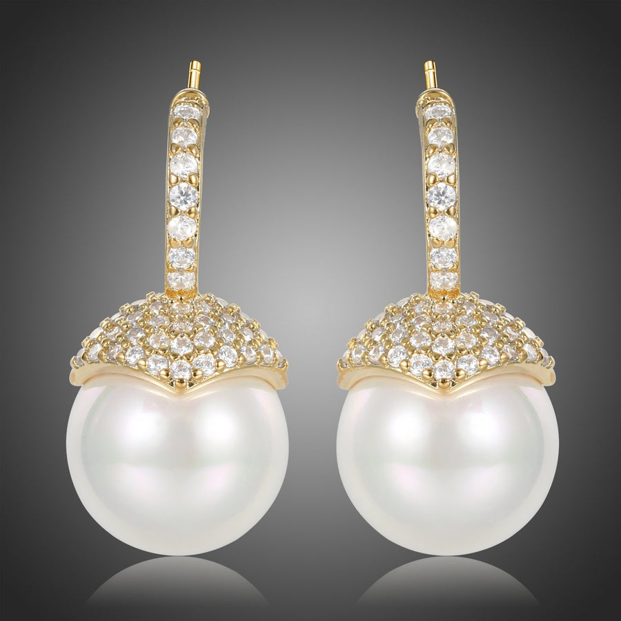KHAISTA imitation pearl stud earrings on white background