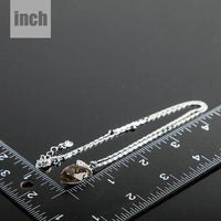 Pendant detail on KHAISTA ink brown crystal pendant necklace