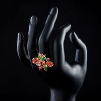 Side angle view highlighting the comfortable band silhouette of the luxury floral insect crystal ring