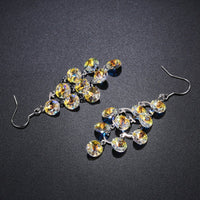 interconnected crystal drop earrings detail view by KHAISTA