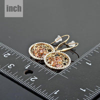 irregular gold CZ drop earrings detail view by KHAISTA