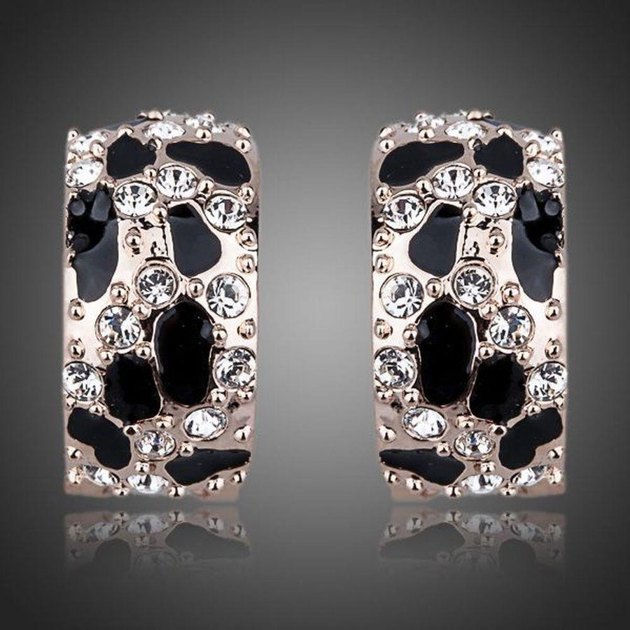 KHAISTA jaguar design crystal clip earrings on white background