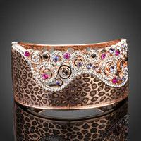 KHAISTA jaguar print crown bangle on white background