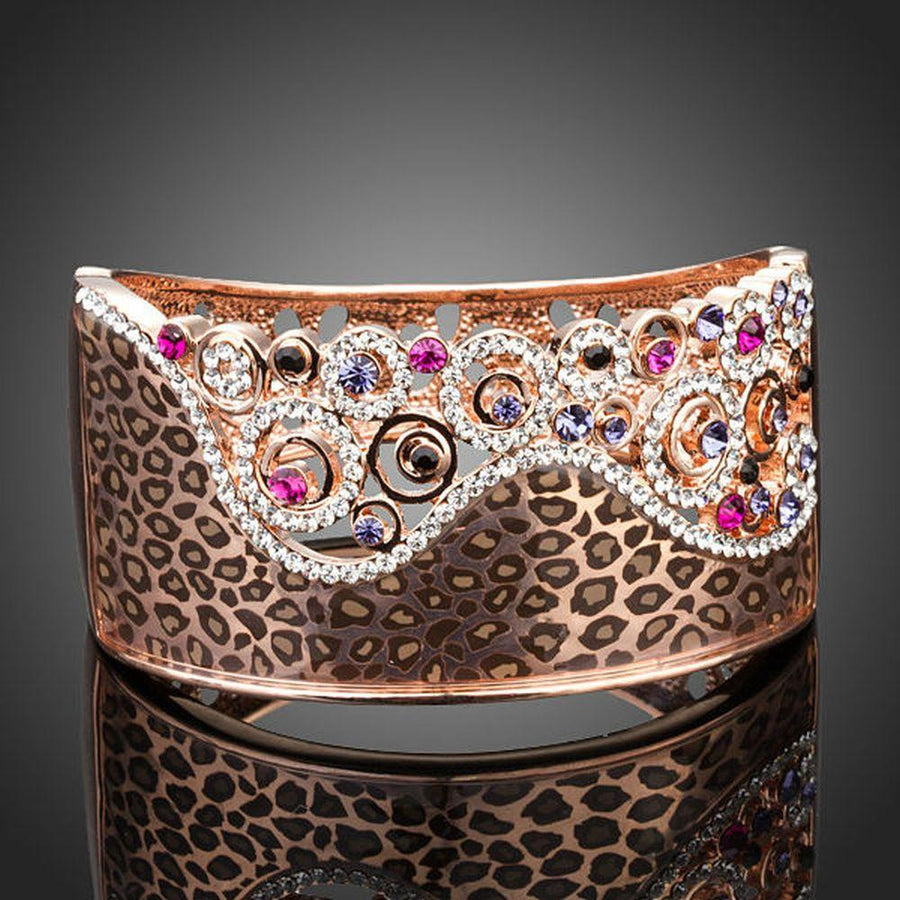 KHAISTA jaguar print crown bangle on white background