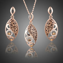 Load image into Gallery viewer, Jaguar Print Drop Earrings + Pendant Necklace Set - KHAISTA Fashion Jewellery
