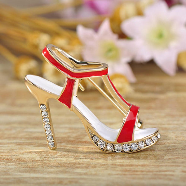 Khaista crystal stiletto heel brooch on white background