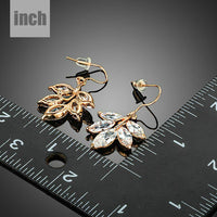 leaf shaped zircon drop earrings detail view by KHAISTA