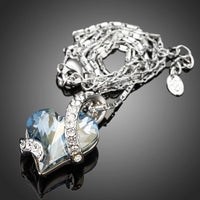 Pendant detail on KHAISTA light blue crystal heart pendant necklace