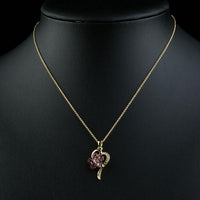Close up detail of KHAISTA light gold pink crystal flower necklace