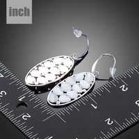 light grey crystal oval drop earrings detail view by KHAISTA