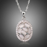 KHAISTA light grey oval crystal necklace on white background