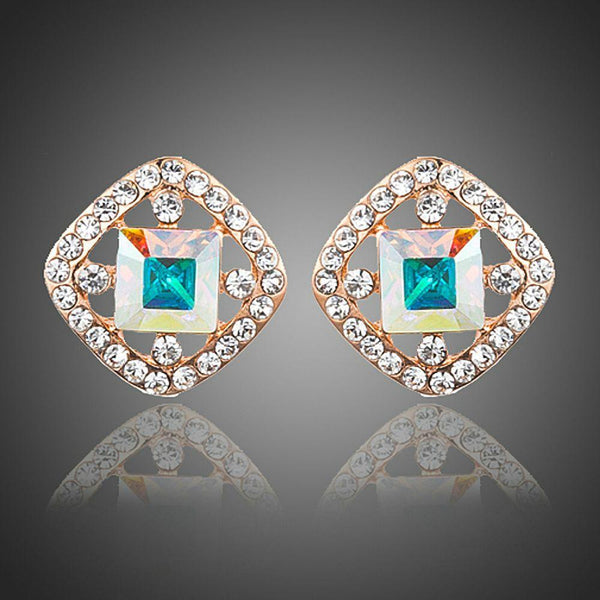 KHAISTA lightweight crystal square stud earrings on white background