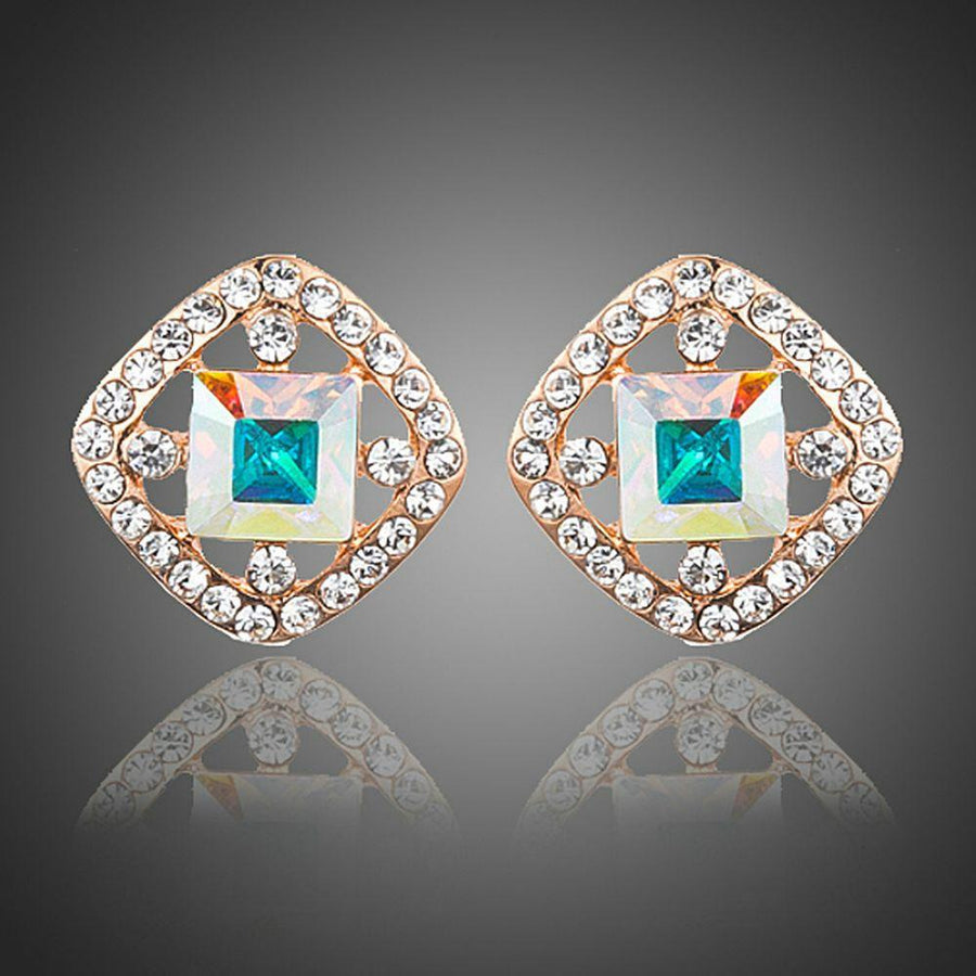 KHAISTA lightweight crystal square stud earrings on white background