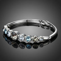 Close up detail of KHAISTA lightweight platinum crystal bangle