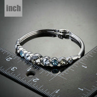 lightweight platinum crystal bangle detail view by KHAISTA