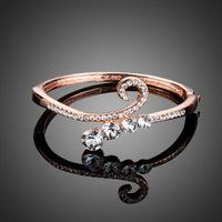 KHAISTA lightweight rose gold plated bangle on white background