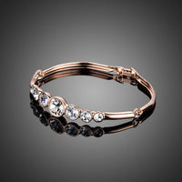 Close up detail of KHAISTA lightweight round crystal bangle