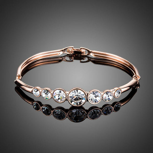 KHAISTA lightweight round crystal bangle on white background