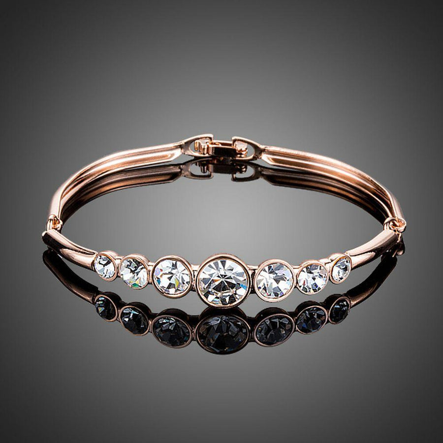 KHAISTA lightweight round crystal bangle on white background