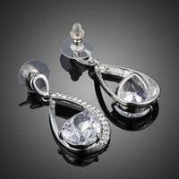 Close up of KHAISTA CZ drop earrings