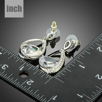 CZ drop earrings detail view by KHAISTA