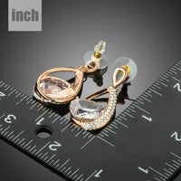 gold plated CZ drop earrings detail view by KHAISTA