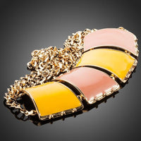 Close up detail of KHAISTA quadrilateral crystal pendant necklace