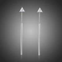 KHAISTA line triangle crystal drop earrings on white background