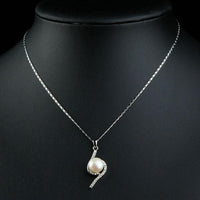 Close up detail of KHAISTA link chain flower pendant necklace