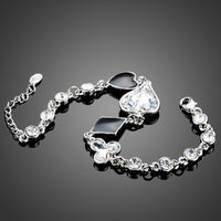 Close up detail of KHAISTA little heart crystal bracelet