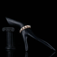 Side angle view of KHAISTA CZ pearl lobster clasp bracelet