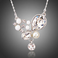 KHAISTA long chain pearl pendant necklace on white background