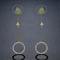 Close up of KHAISTA long chain round crystal drop earrings