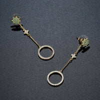 long chain round crystal drop earrings detail view by KHAISTA