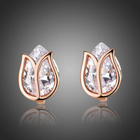 KHAISTA lotus crystal stud earrings on white background