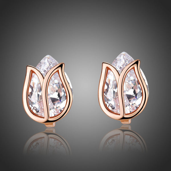 KHAISTA lotus crystal stud earrings on white background