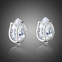 KHAISTA lotus crystal stud earrings on white background
