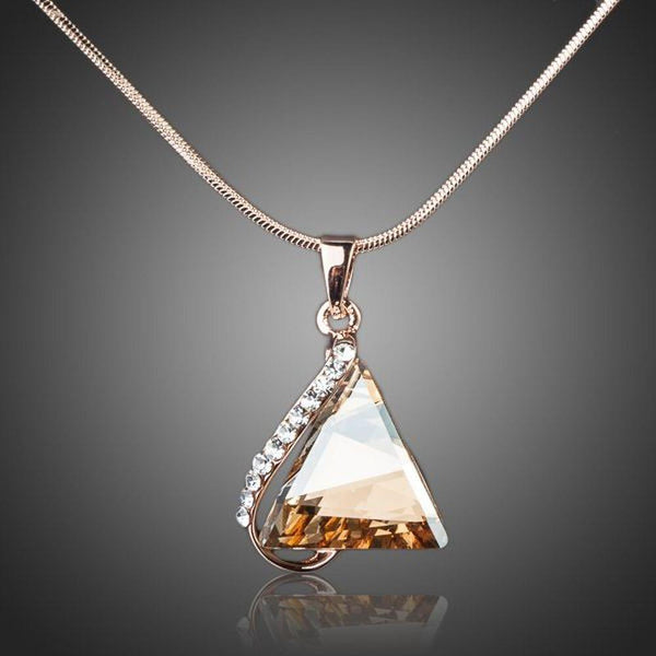 KHAISTA love triangle champagne crystal necklace on white background