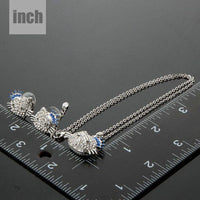 Cat detail on Khaista white gold crystal set