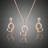 KHAISTA rose gold heart Stellux Austrian crystal set on white background