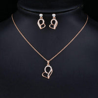 Close up of Stellux heart crystals on KHAISTA rose gold set