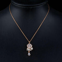 Side angle view of KHAISTA lucky flower waterdrop crystal pendant necklace