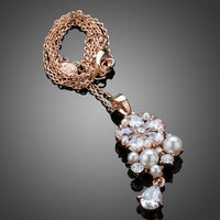 Close up detail of KHAISTA lucky flower waterdrop crystal pendant necklace