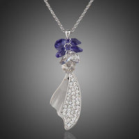 KHAISTA crystal machete pendant necklace on white background